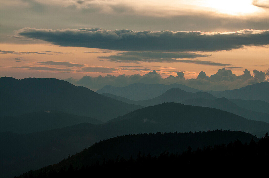 Sunset and clouds over the White Mountains of New Hampshire.