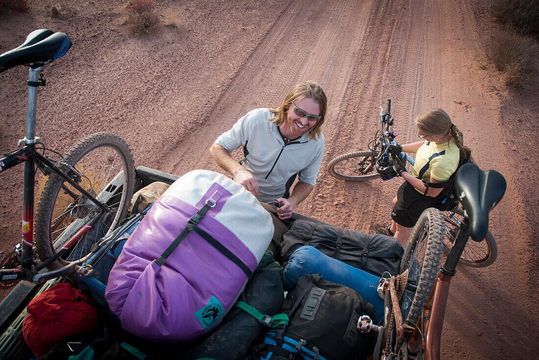 Riders rig a toyota truck with mountain bikes while touring the White Rim Trail near Moab, Utah.