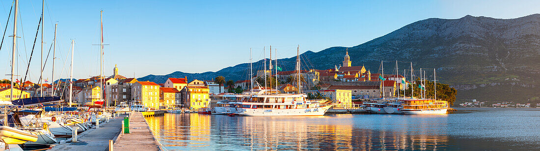 The picturesque coastal village of Korcula illuminated at sunrise, Korcula Town, Korcula, Dalmatia, Croatia, Europe