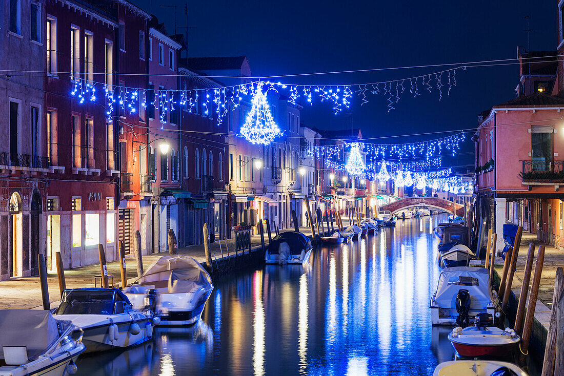 Christmas decoration on a canal at night, Murano, Venice, UNESCO World Heritage Site, Veneto, Italy, Europe