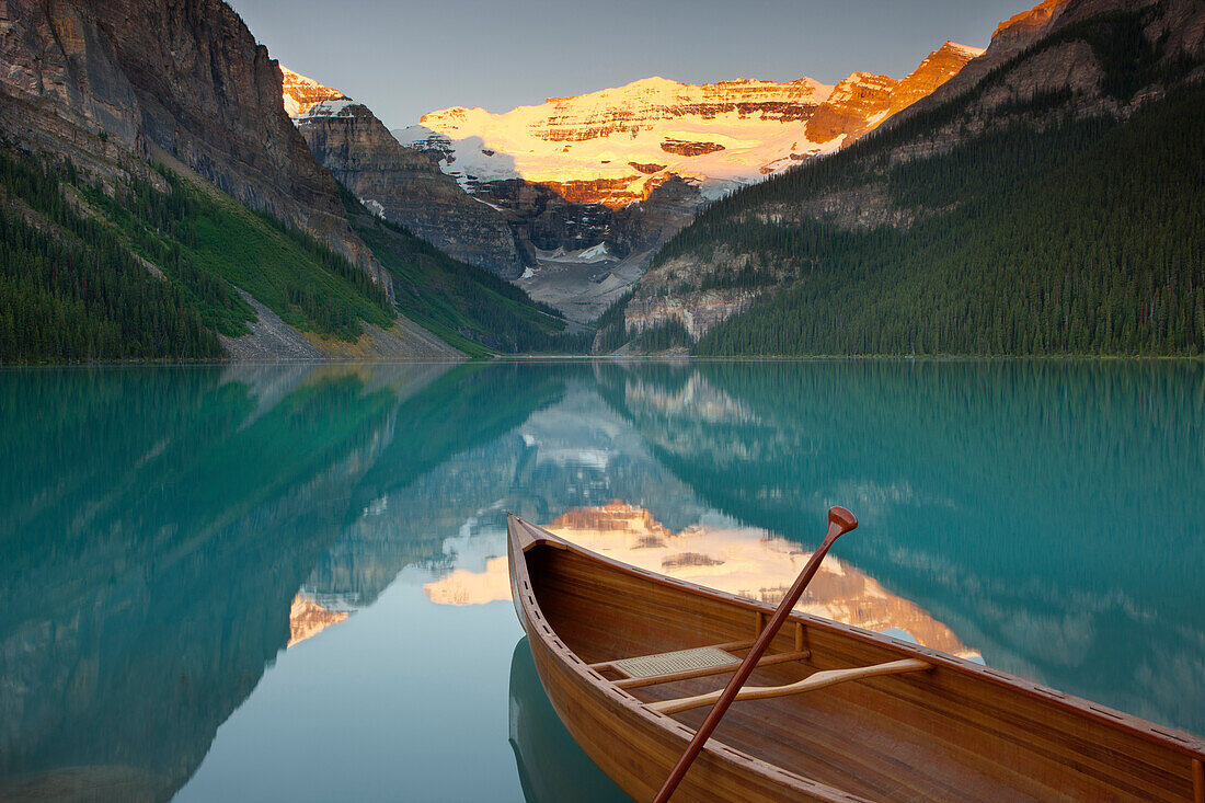 Canoe on Lake Louise at sunrise, Banff National Park, UNESCO World Heritage Site, Alberta, Rocky Mountains, Canada, North America