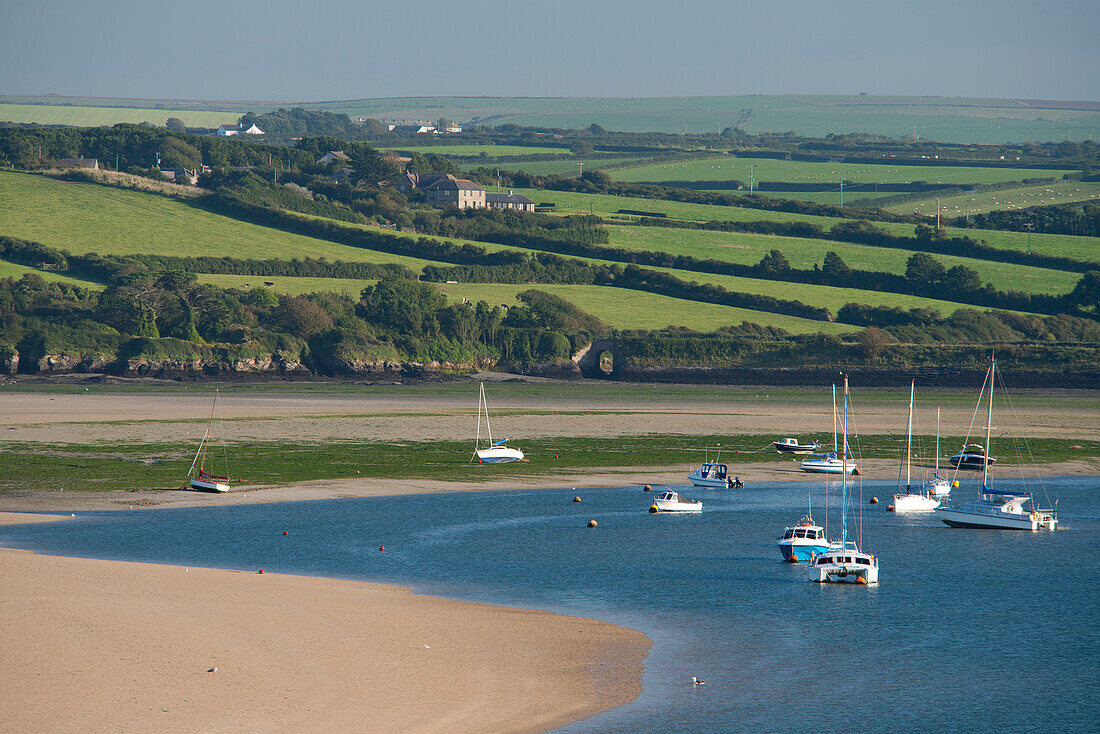 Rolling hills and yachts moored in the Camel Estuary near Padstow, Cornwall, England, United Kingdom, Europe