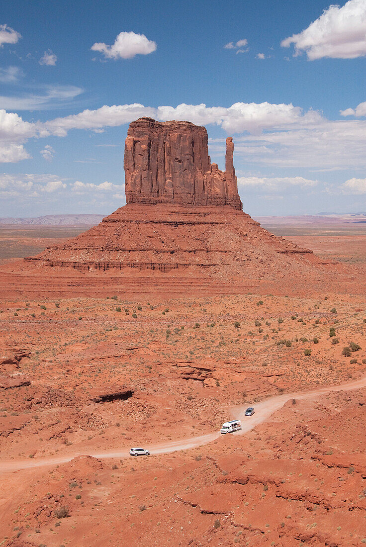 Monument Valley Navajo Tribal Park, Park Road (foreground), West Mitten (background), Utah, United States of America, North America