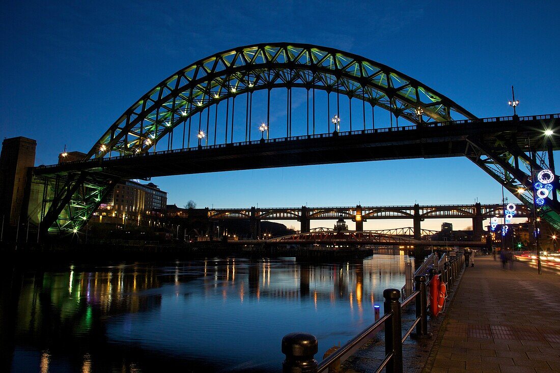 Gateshead Quays with Tyne Bridge and River Tyne swing bridge at night, Tyne and Wear, England, United Kingdom, Europe