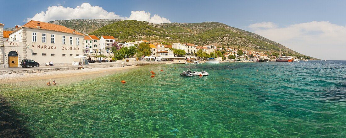 Bol Town and the crystal clear Adriatic Sea, Brac Island, Dalmatian Coast, Croatia, Europe