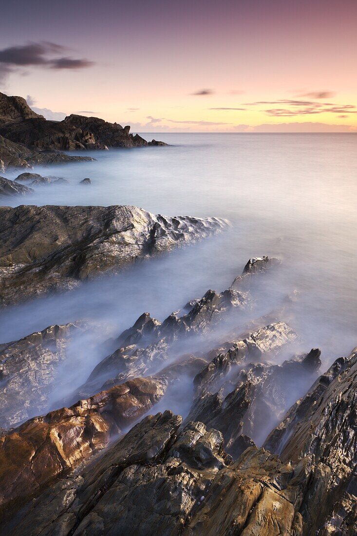 Rocky coast at sunset, Leas Foot Sand, Thurlestone, South Hams, Devon, England, United Kingdom, Europe