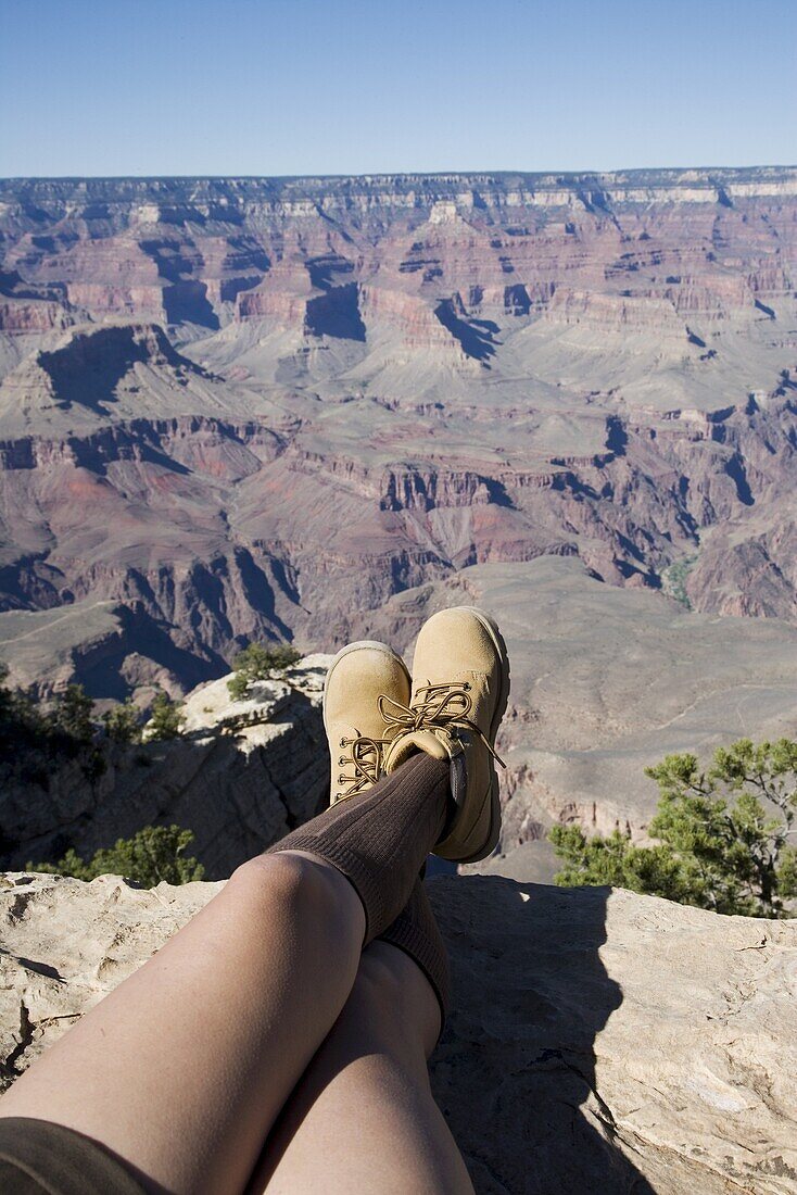 Woman looking over Grand Canyon, Grand Canyon National Park, UNESCO World Heritage Site, Arizona, United States of America, North America