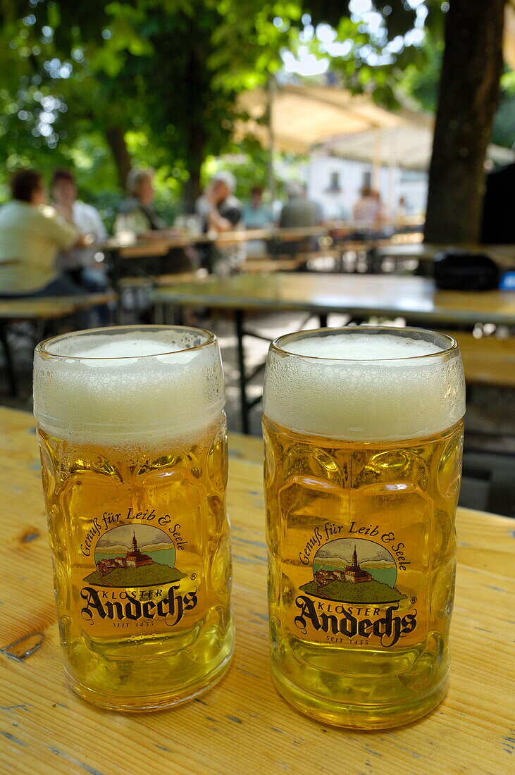 Beer steins in Andechs beer garden, brewed in the monastery, Andechs, near Munich, Bavaria, Germany, Europe