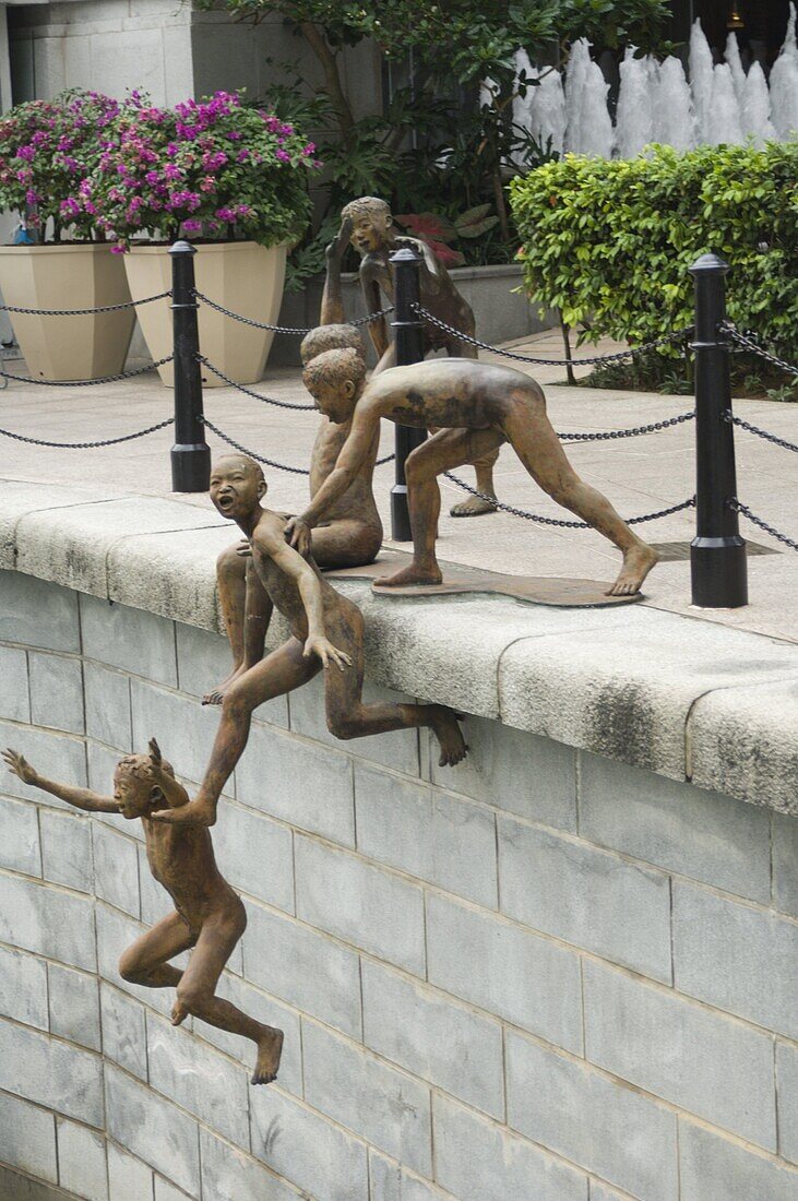 Sculpure of children playing, Boat Quay, Singapore, Southeast Asia, Asia