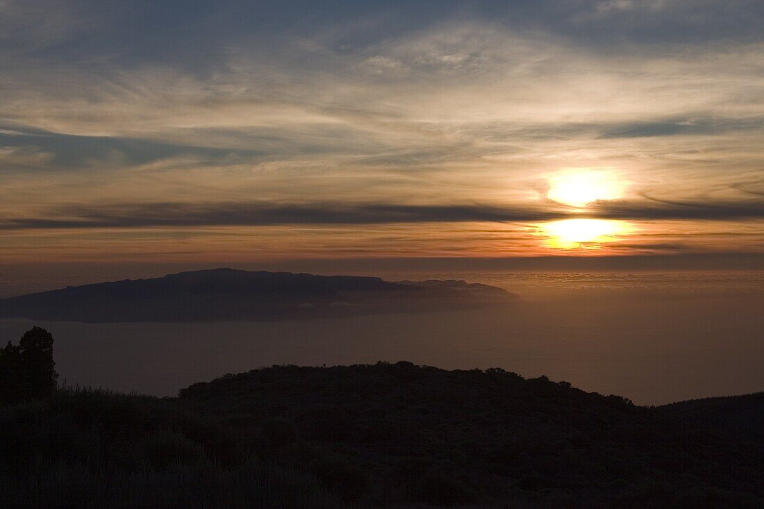 Sunset from Parque Nacional de Las Canadas del Teide (Teide National Park), looking south west to La Gomera, Tenerife, Canary Islands, Spain, Atlantic, Europe