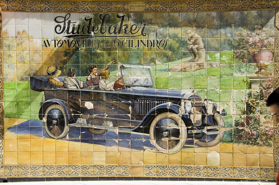 Old tile ad for Studbaker car, Tetuan Street near Sierpes Street, Seville, Andalusia, Spain, Europe