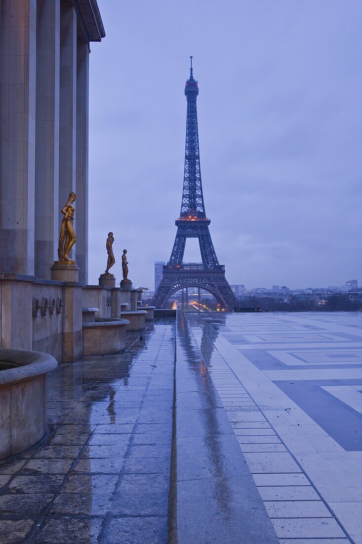 The Eiffel Tower under rain clouds, Paris, France, Europe