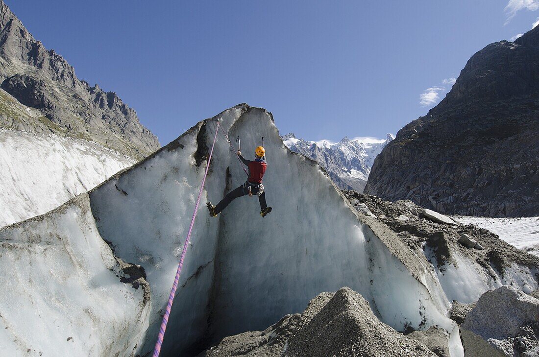 Ice climber at Mer de Glace glacier, Chamonix, Haute-Savoie, French Alps, France, Europe