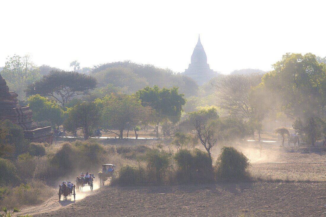 View over the temples of Bagan swathed in early morning mist, from Shwesandaw Paya, Bagan, Myanmar (Burma), Southeast Asia