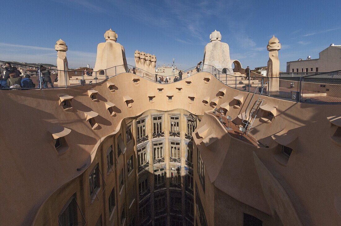 Upper floor and roof chimneys of the apartment building designed by Antonio Gaudi, La Pedrera (Casa Mila), UNESCO World Heritage Site, Passeig de Gracia, Barcelona, Catalonya, Spain