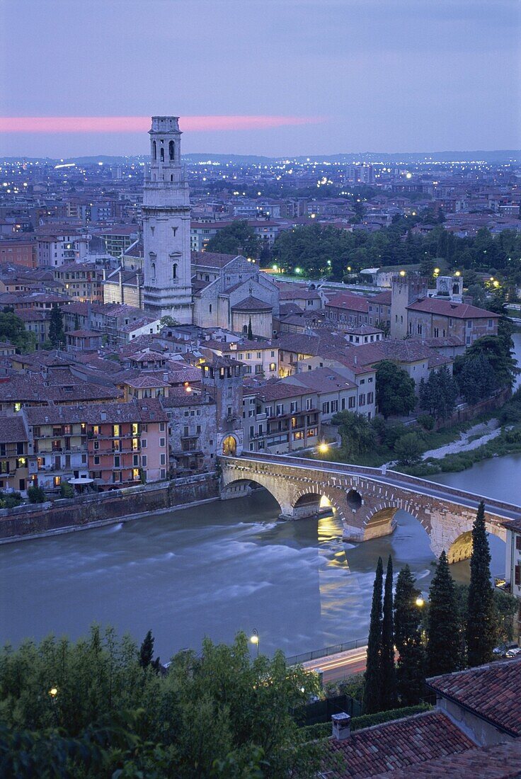 The Ponte Pietra and Anastasia Cathedral at dusk from the Museo Archeologico in the town of Verona, Veneto, Italy, Europe