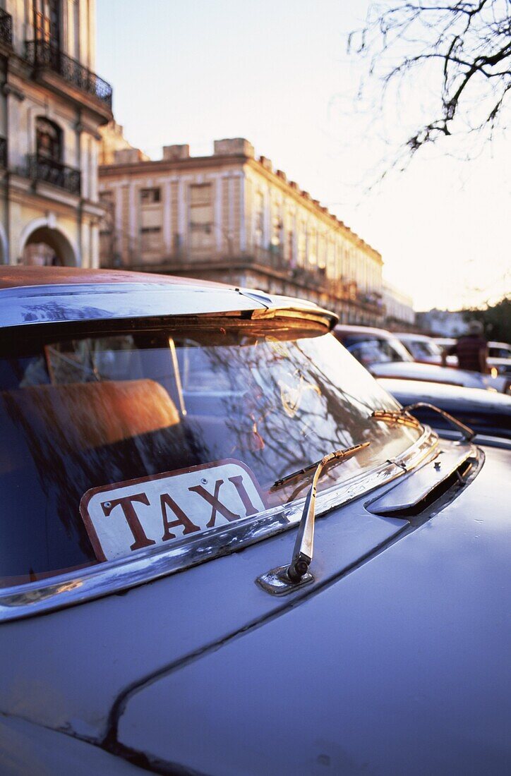 Classic American car with Taxi sign in windscreen, Havana, Cuba, West Indies, Central America