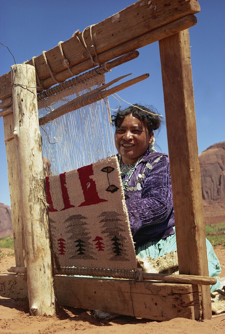 Navajo woman weaving carpet, Monument Valley, Arizona, United States of America, North America