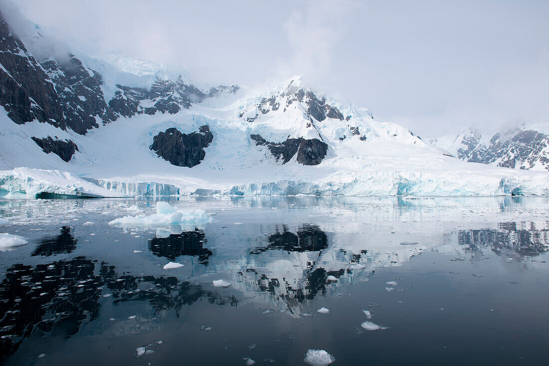 On windstill days, when the mountains and glaciers are reflected in the water's surface, Paradise Bay seems even more magical, Paradise Bay (Paradise Harbor), Danco Coast, Graham Land, Antarctica