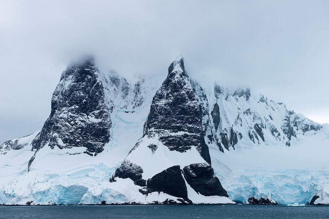 The Lemaire Channel is one of the most beautiful waterways on the northern Antarctic Peninsula and is one of many highlights of a cruise in this harsh area, Lemaire Channel, near Graham Land Antarctica