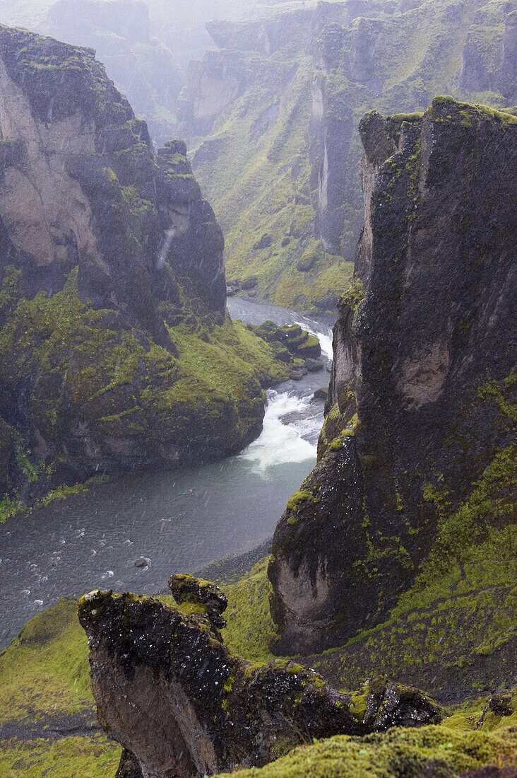 Fjadrargljufur canyon, 100m deep and 2 km long, carved out of palagonite and lava layers by glacial fast-flowing river two million years ago, near Kirkjubaejarklaustur, South Iceland, Polar Regions