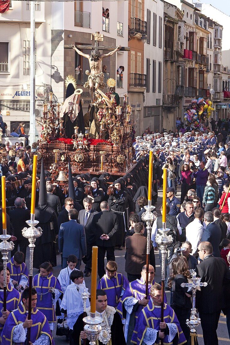 Religious float being carried through the streets during Semana Santa (Holy Week) celebrations, Malaga, Andalucia, Spain, Europe