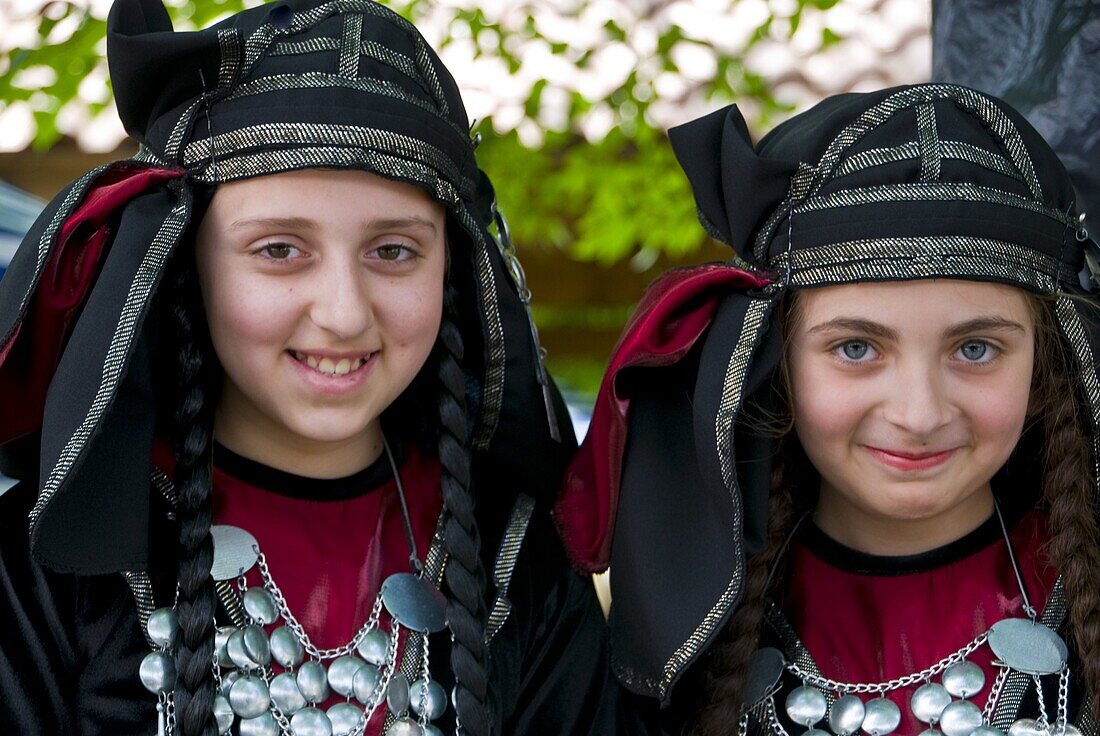 Young traditionally dressed Georgian girls, Sighnaghi, Georgia, Caucasus, Central Asia, Asia
