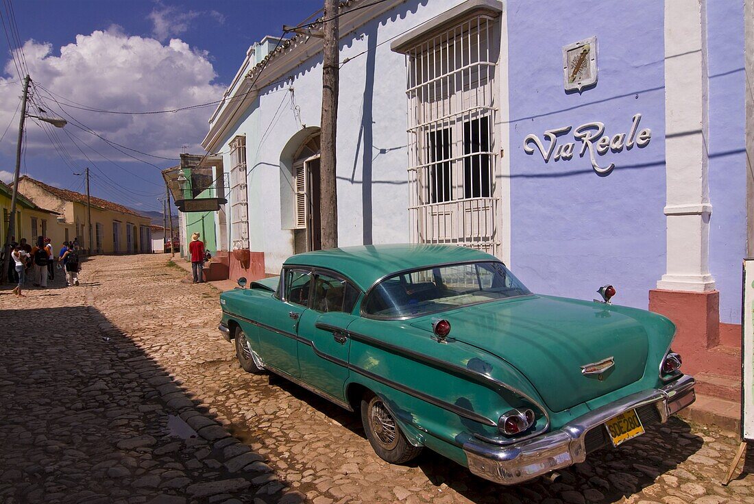 American Oldtimer in the cobbled streets of Trinidad, Cuba, West Indies, Caribbean, Central America