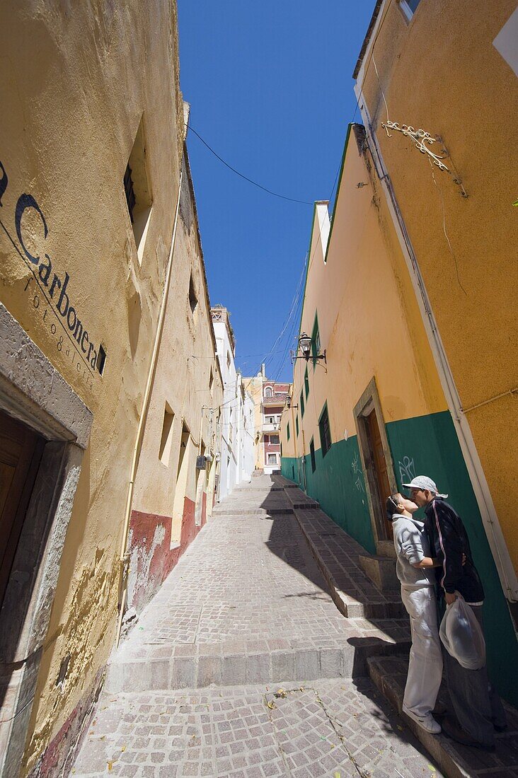 Couple kissing in an alley, Guanajuato, Guanajuato state, Mexico, North America