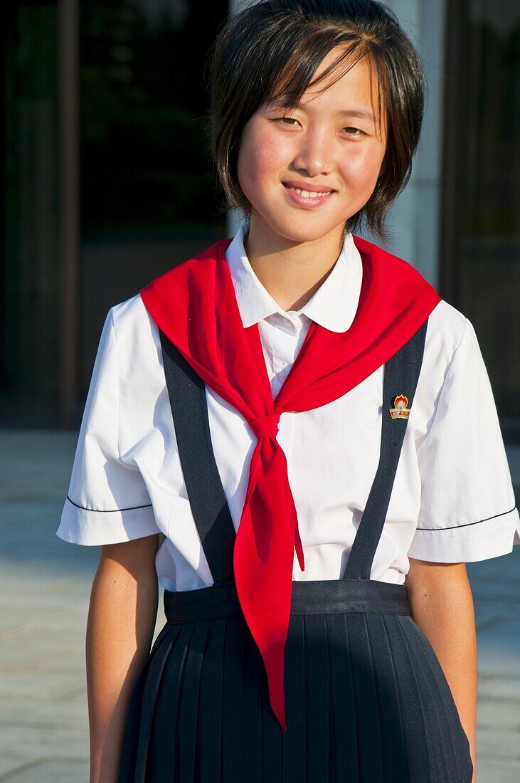 Young communist party girl at the Schoolchildrens palace, Pyongyang, North Korea, Asia