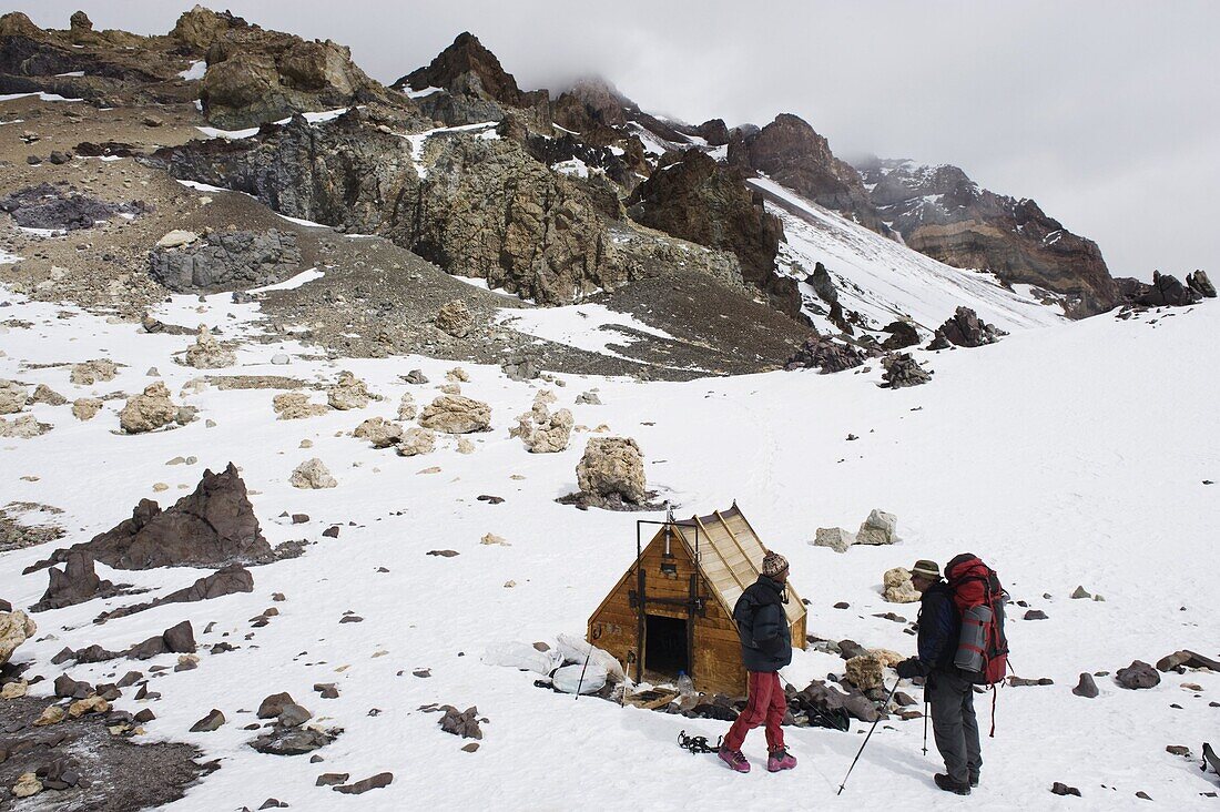 Climbers and hut at camp Berlin at 6000m, Aconcagua 6962m, highest peak in South America, Aconcagua Provincial Park, Andes mountains, Argentina, South America