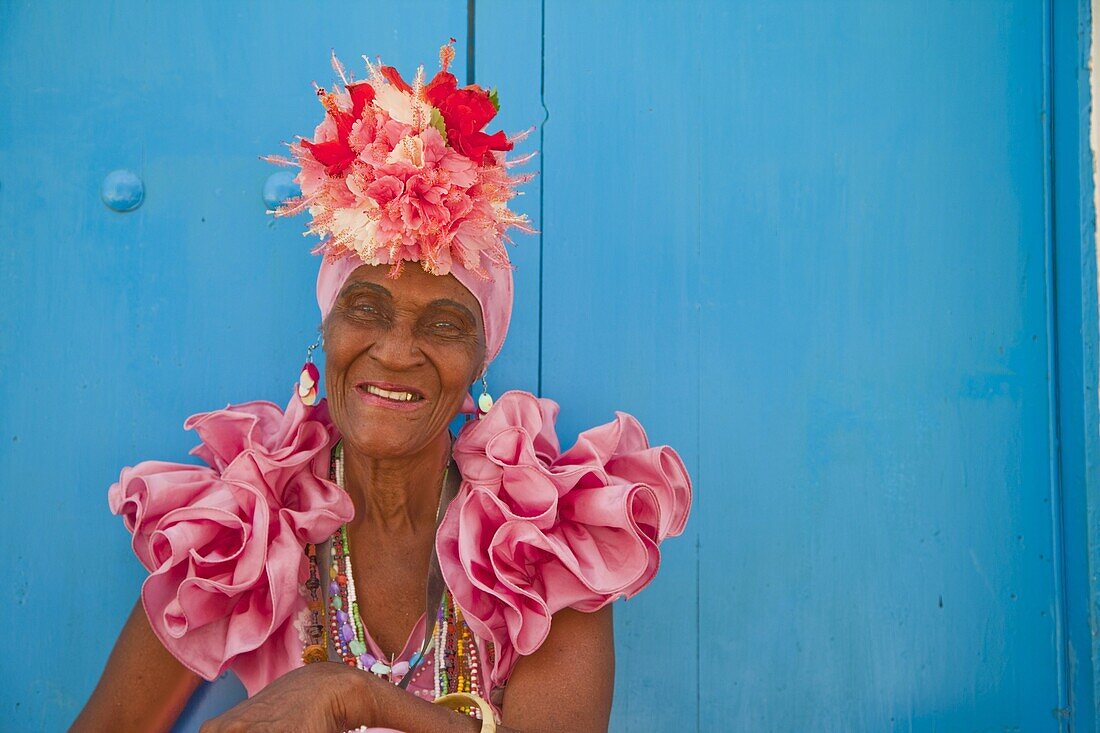 Cuban woman dressed as showgirl, Havana, Cuba, West Indies, Central America