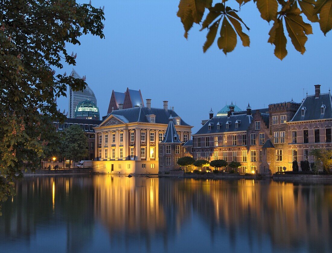 Mauritshuis and government buildings of Binnenhof at night, Hofvijver (Lake Hof Vijver), Den Haag (The Hague), Holland (The Netherlands), Europe