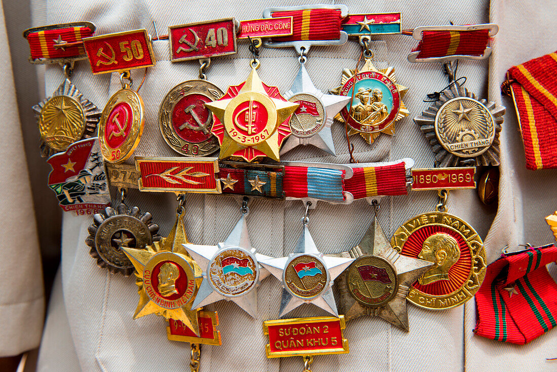 Medals worn by a Vietnamese war veteran visiting the former prison and now museum, Phu Quoc, Mekong Delta, Vietnam, Asia