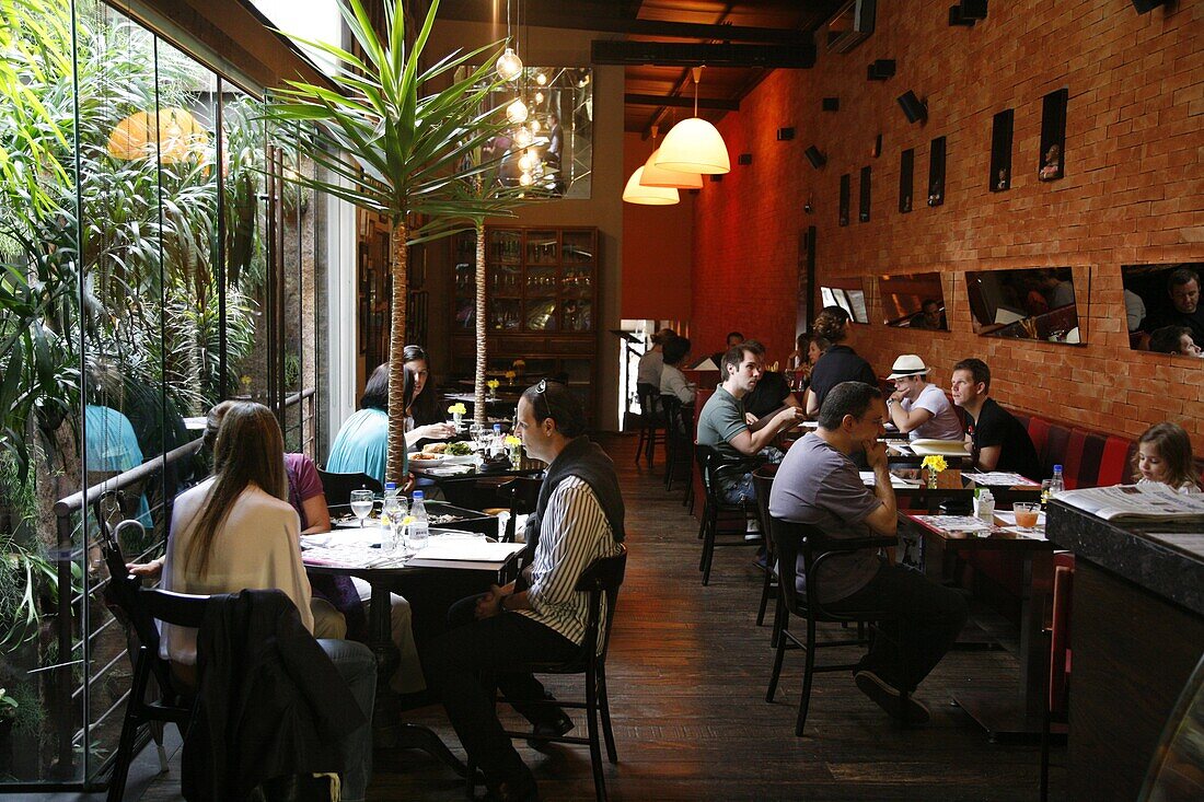 People sitting at Oscar Cafe on Rua Oscar Freire in the Jardins area, Sao Paulo, Brazil, South America