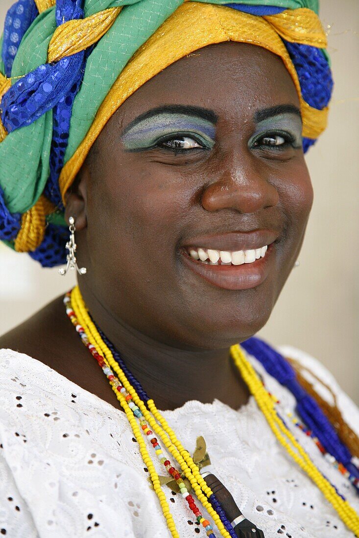 Portrait of a Bahian woman in traditional dress at the Pelourinho district, Salvador, Bahia, Brazil, South America