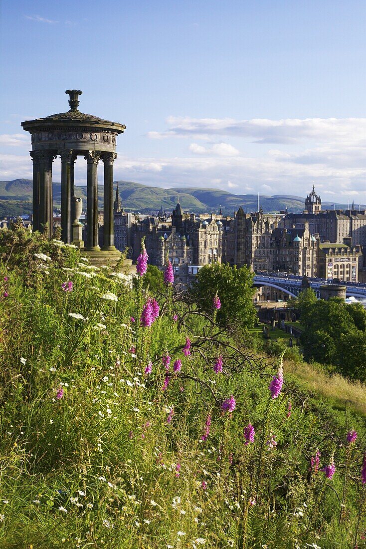 Dugald Stewart Monument and view of Old Town from Calton Hill in summer sunshine, Edinburgh, Scotland, United Kingdom, Europe