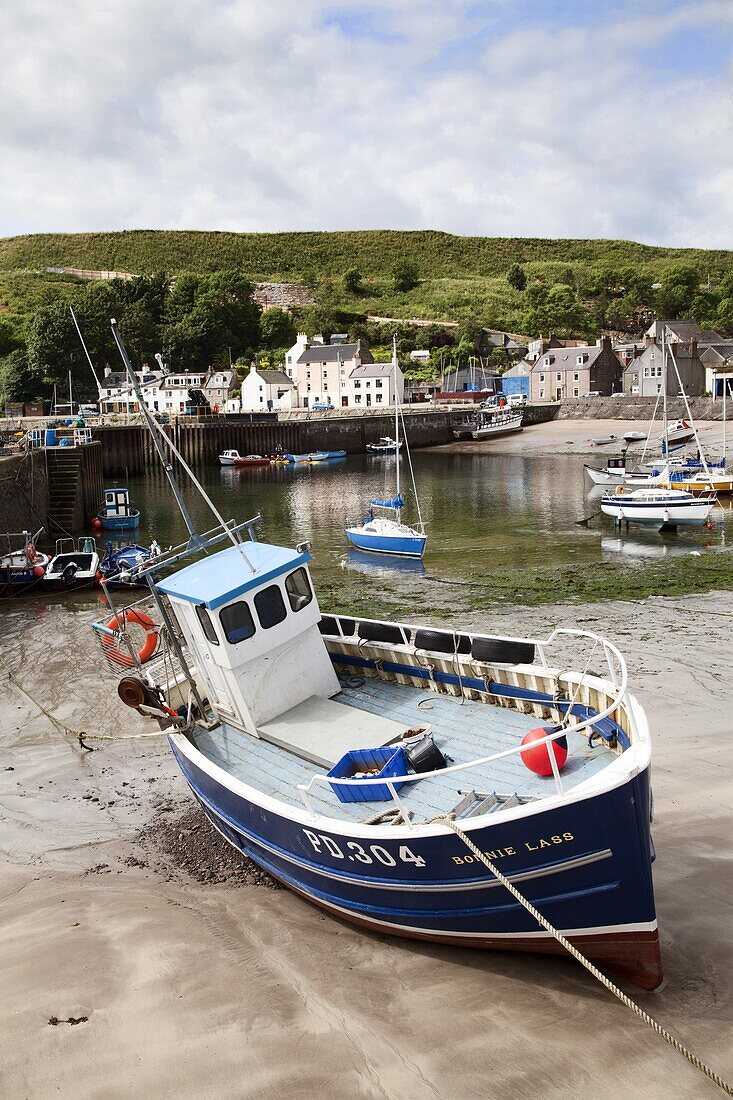 Beached fishing boat in the Harbour at Stonehaven, Aberdeenshire, Scotland, United Kingdom, Europe
