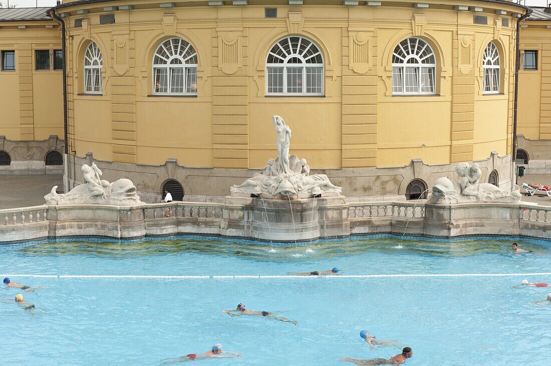 Outdoor pool with men and women at Szechenyi Thermal Baths, Budapest, Hungary, Europe