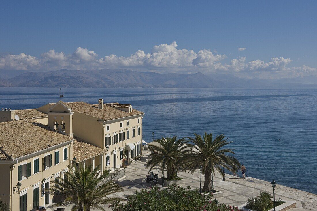 Sea view over a sea side cafe from Corfu Town, Corfu Island, Ionian Islands, Greek Islands, Greece, Europe