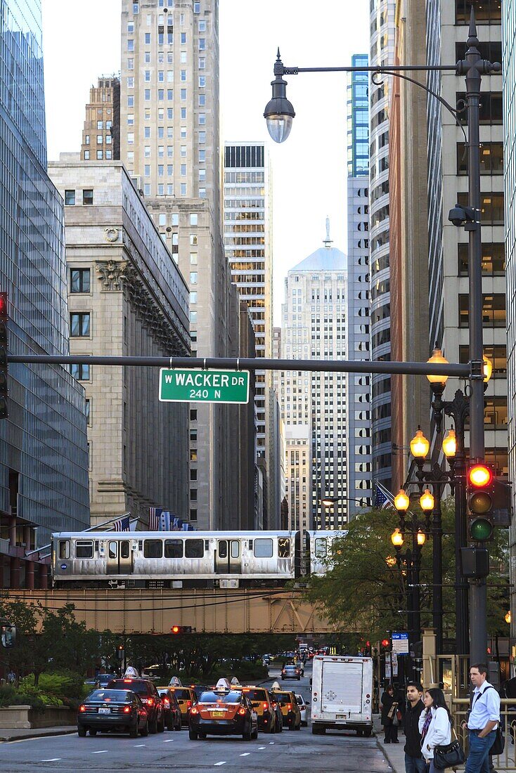 L train on elevated track crosses South LaSalle Street in the Loop district, Chicago, Illinois, United States of America, North America