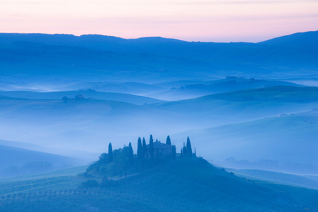Misty dawn view towards Belvedere, across Val d'Orcia, UNESCO World Heritage Site, San Quirico d'Orcia, near Pienza, Tuscany, Italy, Europe