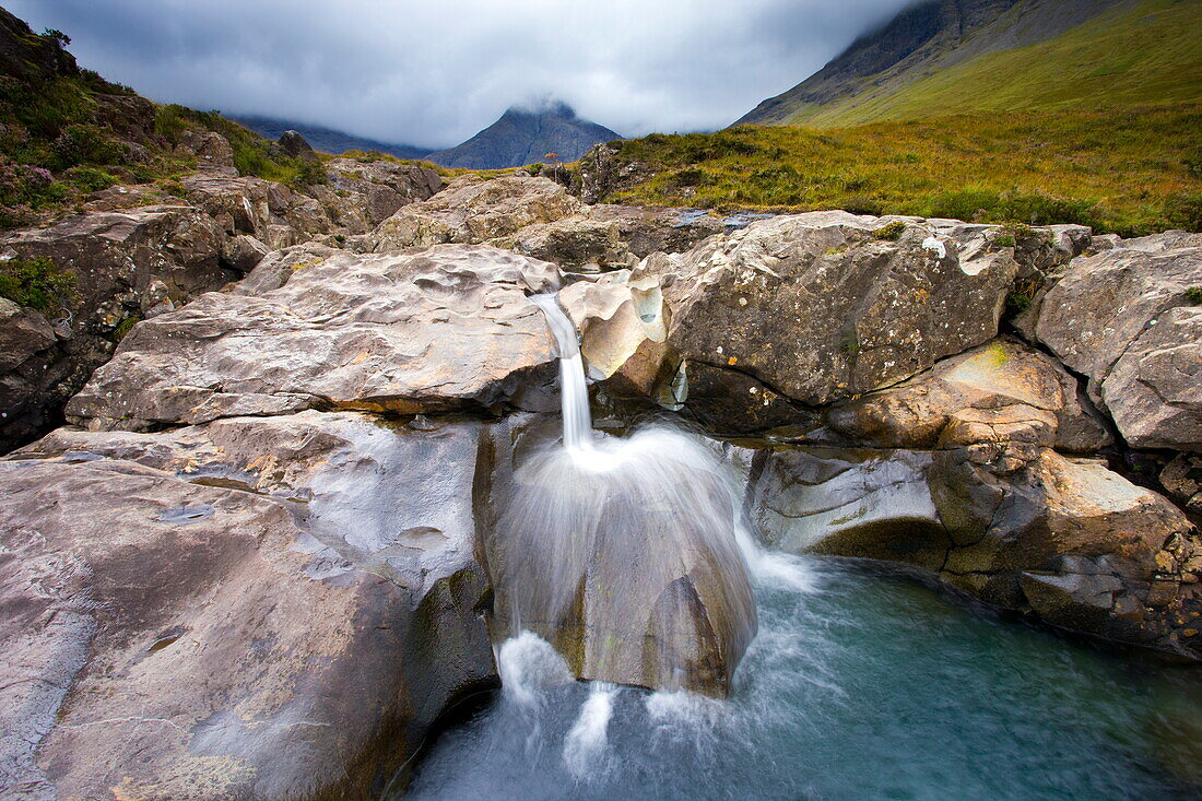 Water cascading over rocks, Fairy Pools, Glenbrittle, Isle of Skye, Highland, Scotland, United Kingdom, Europe