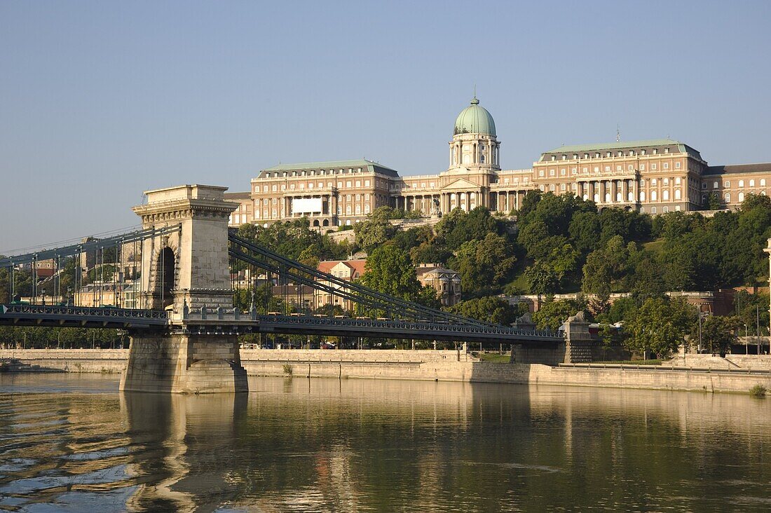 The Chain Bridge over the Danube River and Castle Hill seen from a boat, Budapest, Hungary, Europe