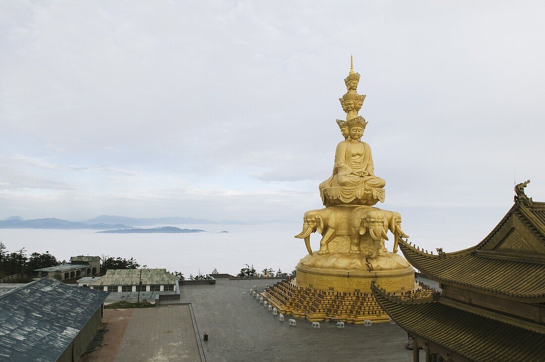 Sea of clouds surrounds the Jinding temple on the top of Golden Summit on Mount Emei Shan, Mount Emei Scenic Area, UNESCO World Heritage Site, Sichuan Province, China, Asia