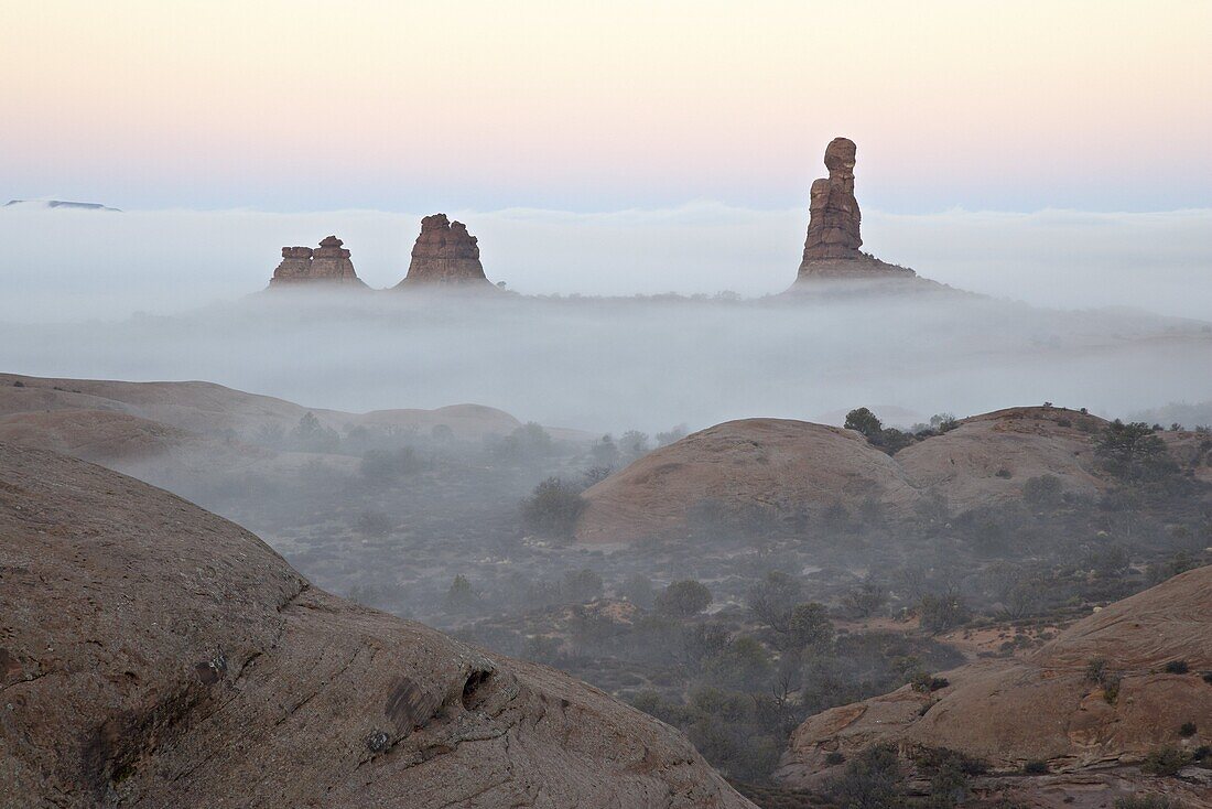 Balanced Rock on a foggy morning at sunrise, Arches National Park, Utah, United States of America, North America