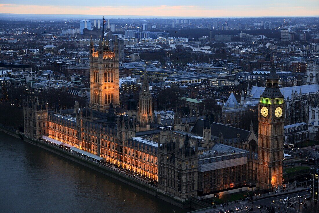 Aerial view of the Palace of Westminster and Big Ben on a winter evening in central London from high over the River Thames, UNESCO World Heritage Site, London, England, Europe