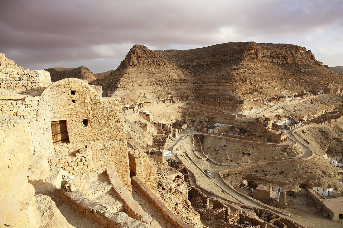 'Granaries (ghorfas) and troglodyte dwellings at hillside Berber village of Chenini, Tunisia, North Africa, Africa'10;'