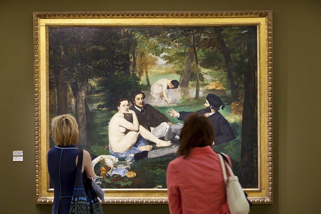 Visitors enjoying Le Dejeuner sur L'Herbe by Manet, Musee d'Orsay, Paris, France, Europe
