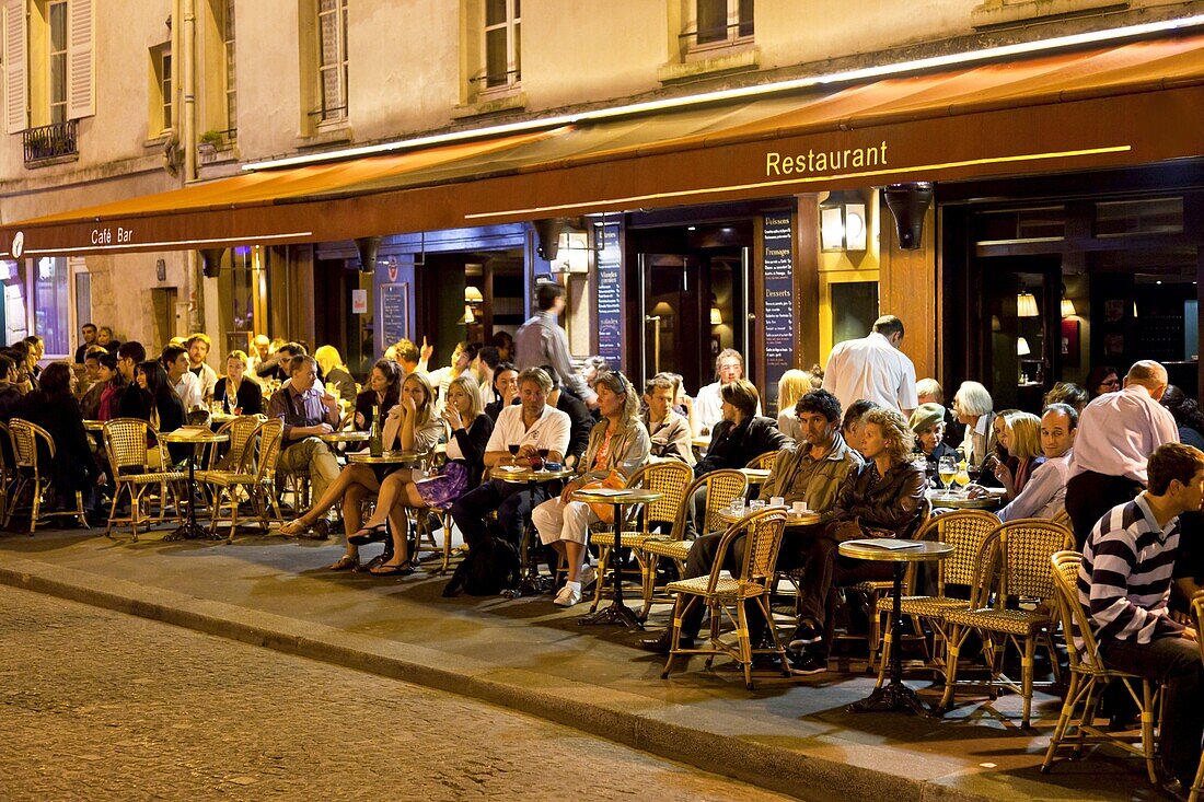 Cafe scene at night, Paris, France, Europe